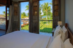 Ένα ή περισσότερα κρεβάτια σε δωμάτιο στο Vila Angatu Eco Resort SPA +271 φωτογραφίες