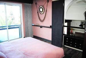 Katil atau katil-katil dalam bilik di Paradise Essaouira Appartement +36 gambar