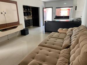 Χώρος καθιστικού στο Casa com piscina 2 quartos em Luzimangues Porto Nacional casa de temporada Summer House