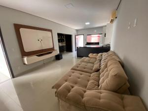 Χώρος καθιστικού στο Casa com piscina 2 quartos em Luzimangues Porto Nacional casa de temporada Summer House