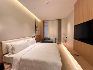 A television and/or entertainment centre at Fairfield by Marriott Shanghai Hongqiao
