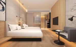 A bed or beds in a room at Fairfield by Marriott Shanghai Hongqiao