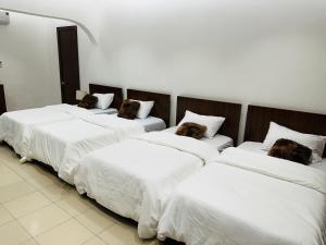 Postel nebo postele na pokoji v ubytování Monarch Enclave Accra