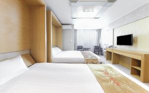 TV a/nebo společenská místnost v ubytování Joy Hotel