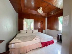 Voodi või voodid majutusasutuse Big Fish Resort Koh Tao toas