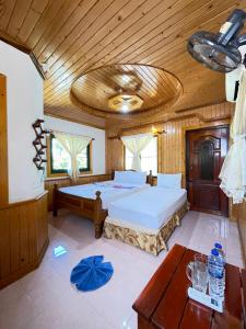 Voodi või voodid majutusasutuse Big Fish Resort Koh Tao toas