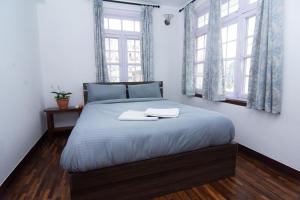 The Loft by Fresco Retreat 객실 침대