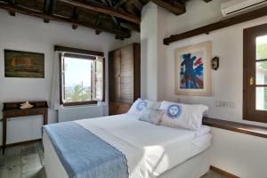 Postel nebo postele na pokoji v ubytování Aeolos Hotel & Villas - Pelion + 37 fotografií