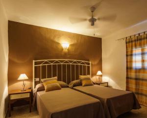Cama o camas de una habitación en Can Beia Rural House Ibiza