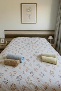 เตียงในห้องที่ Fribourg Home Junior