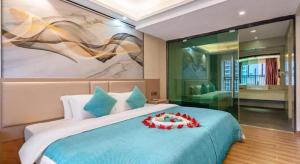 Postel nebo postele na pokoji v ubytování Oriental Hotel