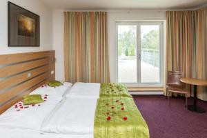 Katil atau katil-katil dalam bilik di Hotel Port Doksy