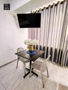 TV a/nebo společenská místnost v ubytování Comfort Hostal Lima
