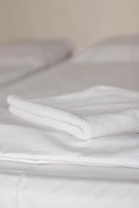 Cama ou camas em um quarto em Villa ENTO HotelWestEnd