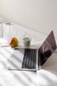 Cama ou camas em um quarto em Villa ENTO HotelWestEnd