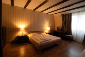 Cama ou camas em um quarto em Villa ENTO HotelWestEnd