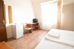 Cama ou camas em um quarto em Villa ENTO HotelWestEnd
