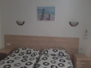 Postel nebo postele na pokoji v ubytování Hotel Condestable