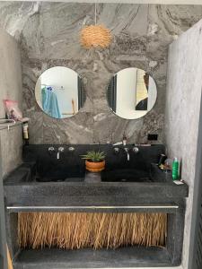 a bathroom with a black sink and two mirrors at V198 Quiet 2BR Villa with Garden & Private Pool in Ban Khlong Mae Nam