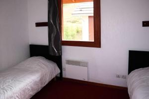 Posteľ alebo postele v izbe v ubytovaní Chalet La Combe D Or - Chalet mitoyen en résidence de standing MAE-3874