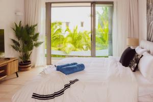 Voodi või voodid majutusasutuse Manta Cove by Horizon Holidays toas