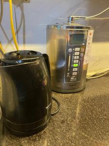 a toaster and a blender sitting on a counter at Lee Homestay in Hanoi +153 photos