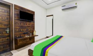Itsy Hotels Anjali Mahal, 500 Mtrs From Mathura Railway Station客房内的一张或多张床位
