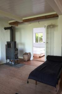 Posezení v ubytování Guest house Æbelnæs, Møn