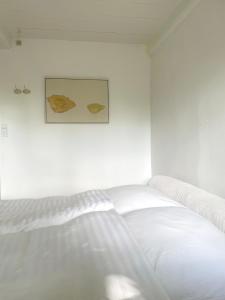 Postel nebo postele na pokoji v ubytování Guest house Æbelnæs, Møn