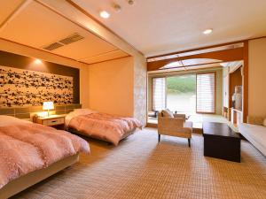Voodi või voodid majutusasutuse Ooedo Onsen Monogatari Premium Hotel New Shiobara toas