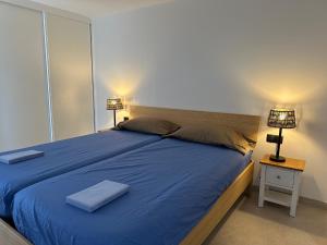 Giường trong phòng chung tại Sun and Beach Lovers San Yago La Pineda