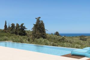 Kolam renang di atau dekat dengan Blue Zone Villa, a SeaView Sanctuary with Pool, By ThinkVilla