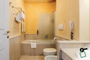 Koupelna v ubytování HOTIDAY Room Collection - Calambrone