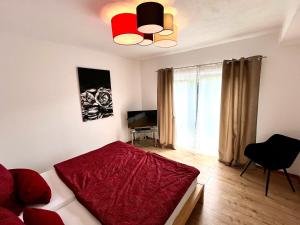 TV a/nebo společenská místnost v ubytování Ferienwohnung Ricke