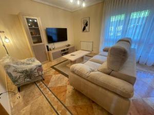 Μια τηλεόραση ή/και κέντρο ψυχαγωγίας στο Casa Trasgu para 6 personas en Infiesto