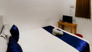 Postel nebo postele na pokoji v ubytování NamRoom at Tomang