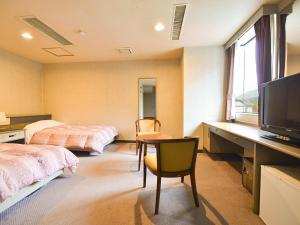 Voodi või voodid majutusasutuse Ooedo Onsen Monogatari Premium Hotel New Shiobara toas