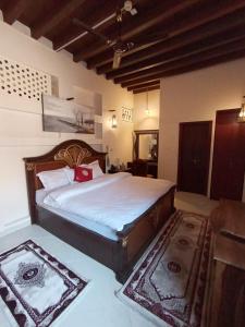 Ein Bett oder Betten in einem Zimmer der Unterkunft Hyba Heritage Guest House