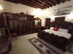 Ein Bett oder Betten in einem Zimmer der Unterkunft Hyba Heritage Guest House