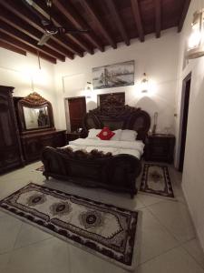 Ein Bett oder Betten in einem Zimmer der Unterkunft Hyba Heritage Guest House