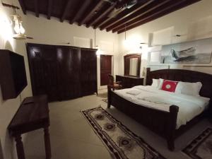 Ein Bett oder Betten in einem Zimmer der Unterkunft Hyba Heritage Guest House