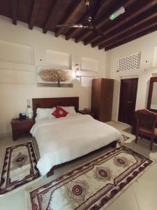 Ein Bett oder Betten in einem Zimmer der Unterkunft Hyba Heritage Guest House
