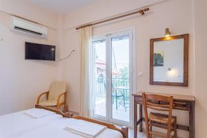 Billede fra billedgalleriet på Vasiliki Apartments i Stoupa + 37 billeder