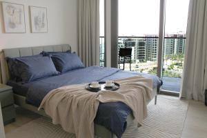 Ένα ή περισσότερα κρεβάτια σε δωμάτιο στο Palace Residences luxurious 2 bedroom with breathtaking views +24 φωτογραφίες