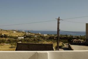 a view of the ocean from the top of a building at Cuarenta tinos in Agios Fokas