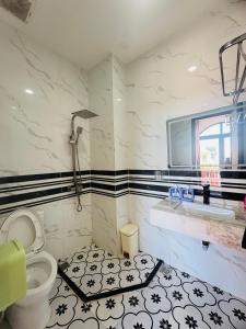 Koupelna v ubytování Mila Homestay Grand World Phú Quốc + 36 fotografií