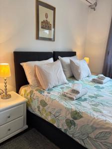Katil atau katil-katil dalam bilik di Zeravica Rooms B&B