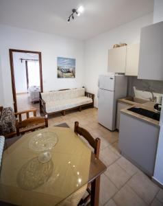 Kuchyň nebo kuchyňský kout v ubytování Lilian Beachfront Apartments + 37 fotografií