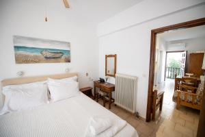Postel nebo postele na pokoji v ubytování Lilian Beachfront Apartments