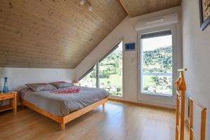 Ένα ή περισσότερα κρεβάτια σε δωμάτιο στο Chalet de la Lunelle